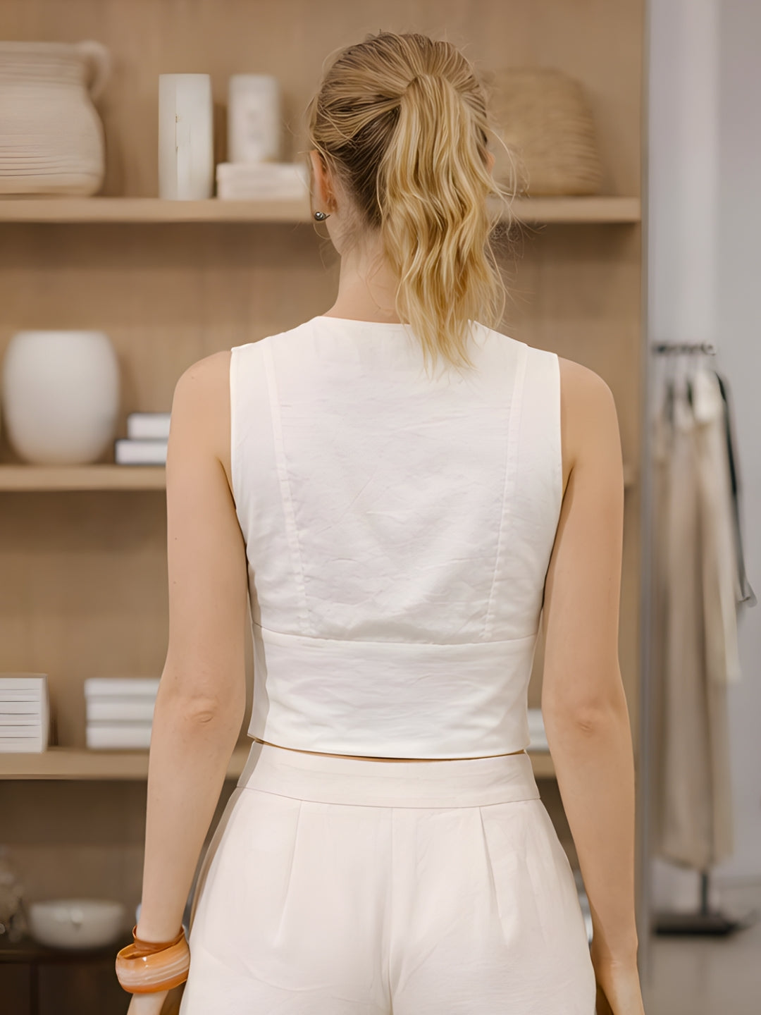 Off White Solid Sleeveless Top